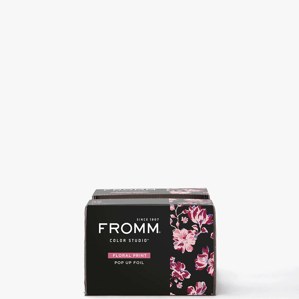 a .GIF of a hand pulling out fromm pro floral print pop up hair foils out of box